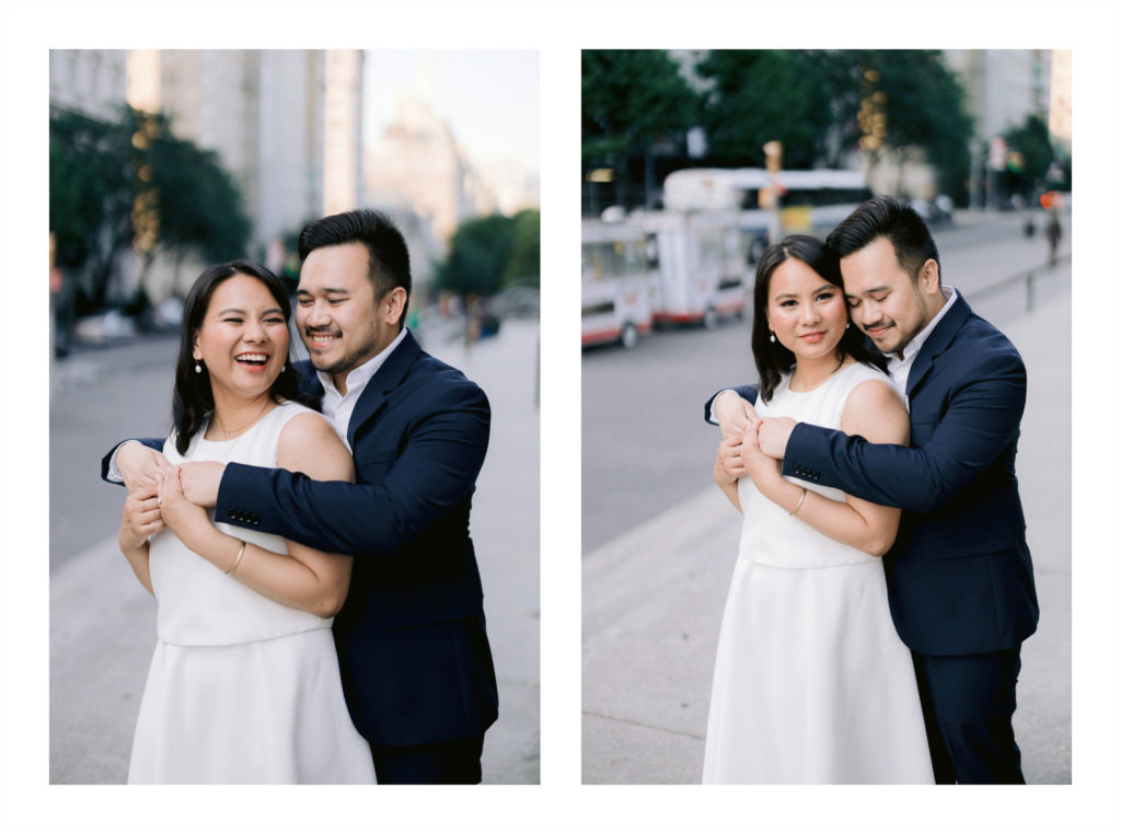 Man hugs his fiancee from behind on a sidewalk of New York City Jenny Fu