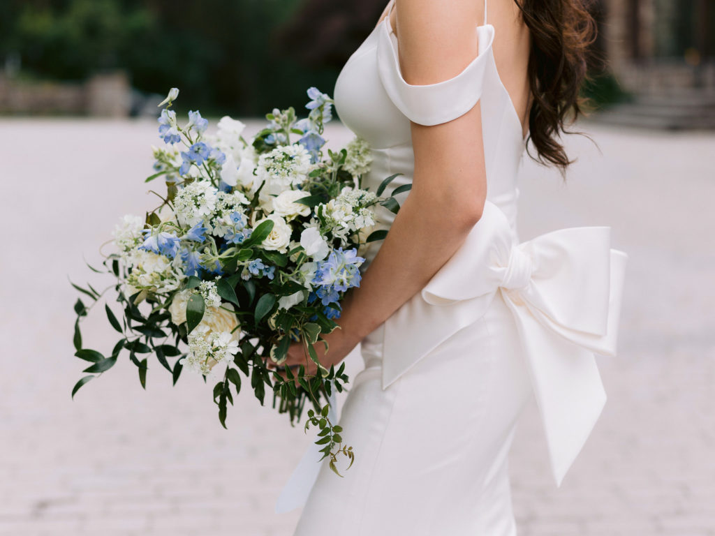 close up of a bride's gorgeous white and blue-flowered bouquet in South Salem NY