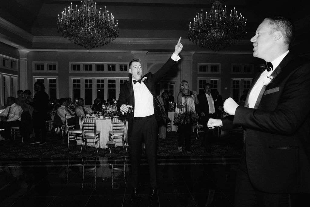 The groom dances up a storm in the ballroom at Le Chateau in South Salem NY