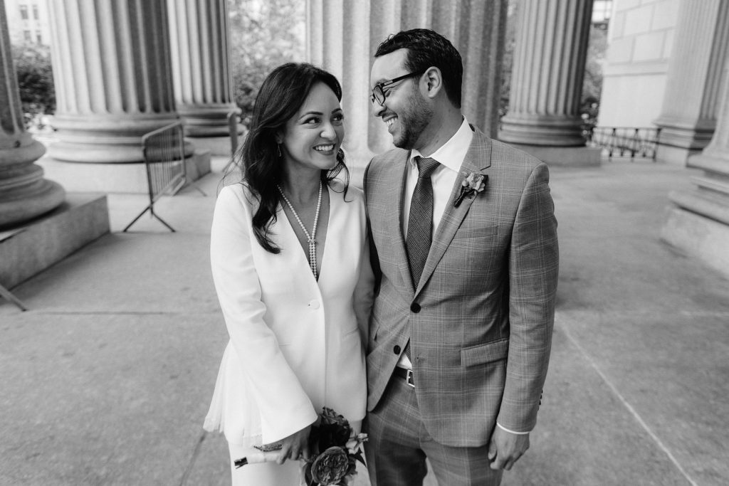 couple smiles at each other after they eloped in this chic NYC elopement