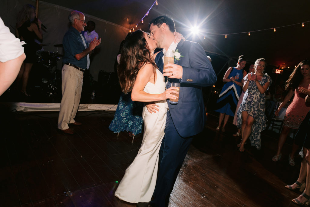 bride and groom ham it up on the dancefloor during their oceanside tent reception in cape cod. Photo by Jenny Fu New York WEdding Photographer