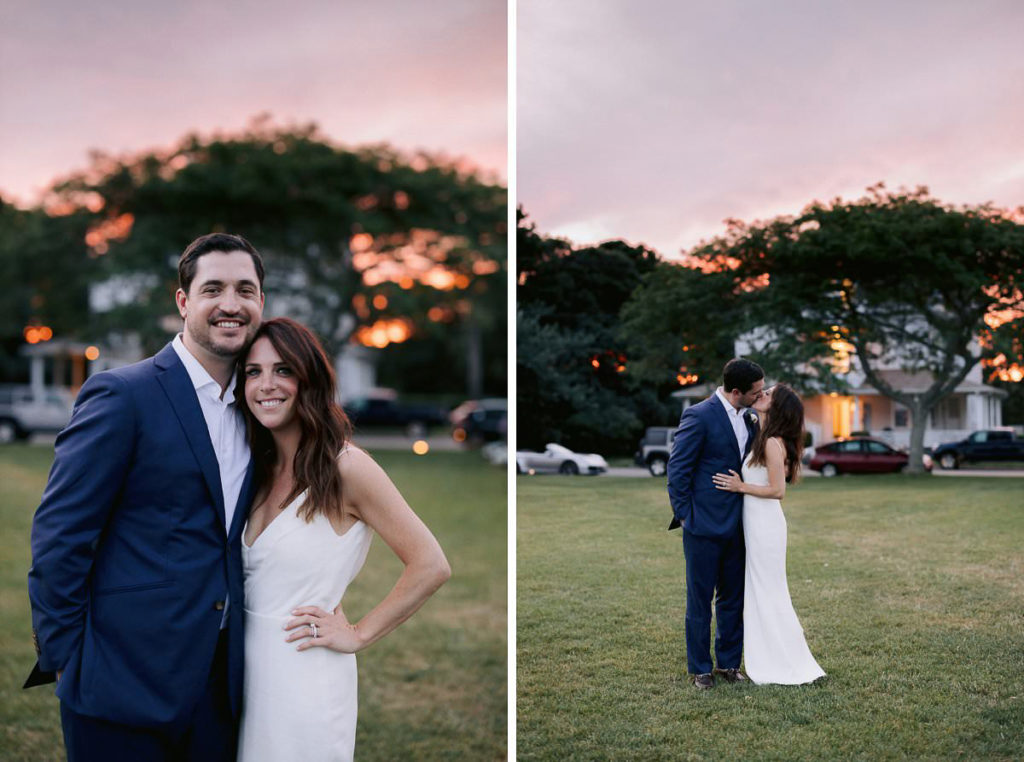 bride and groom pose outside during the sunset in the middle of the their wedding reception