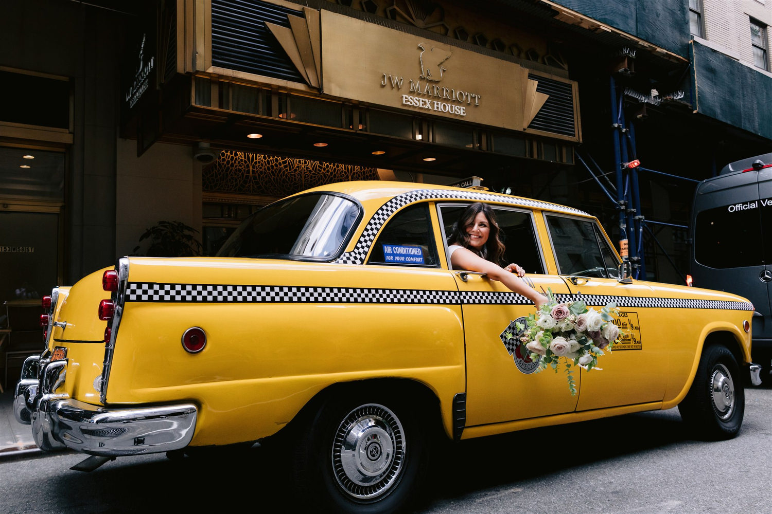 old new york, new york wedding, jenny fu, bride, classic new york wedding,  beautiful bride looks out car window, film cars New York, checker cab, Manhattan wedding