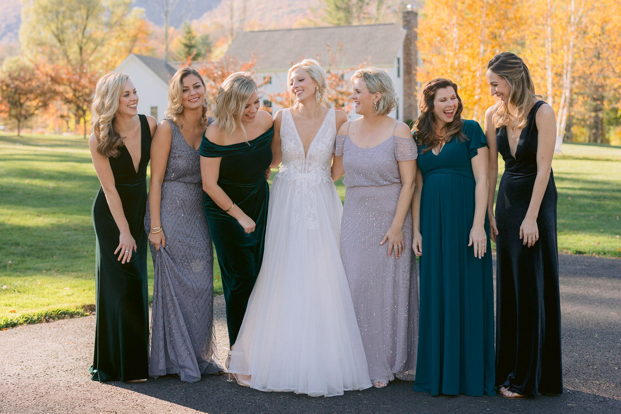 Outdoor wedding, bride and bridesmaids, mismatched dresses