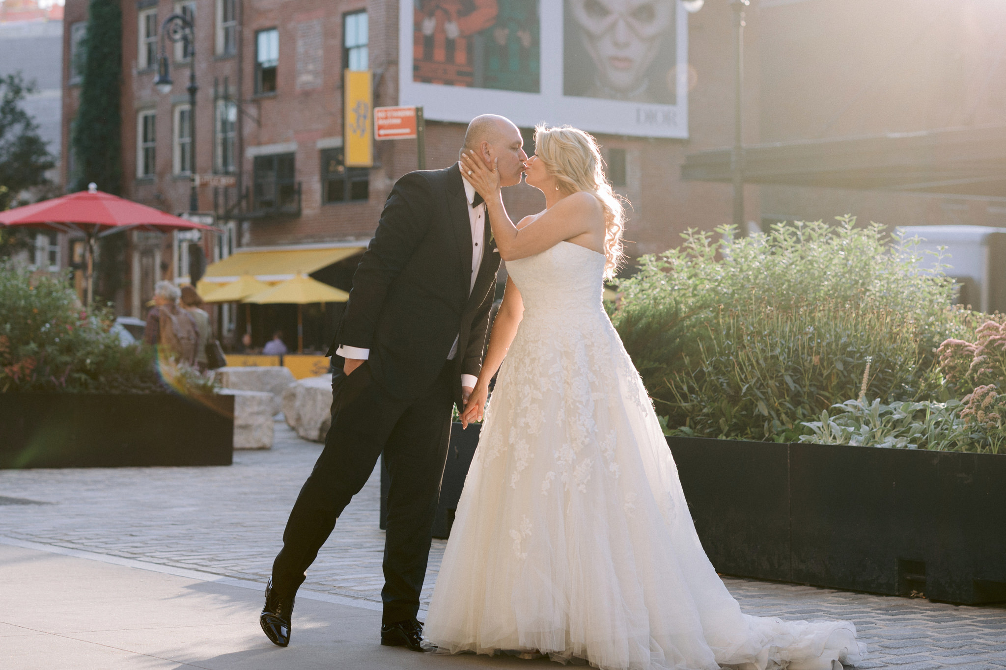 Bride and groom kissing in Brooklyn