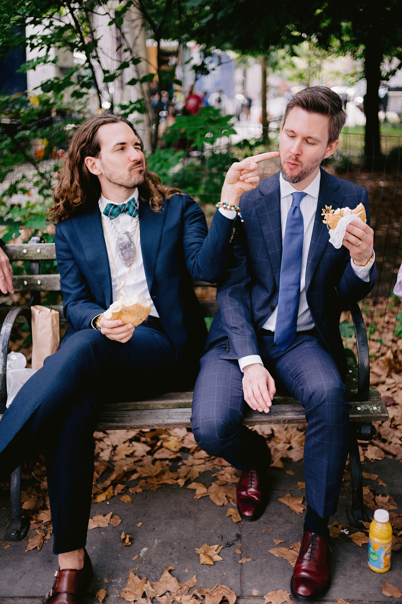 Husband and husband enjoying bagels after their city hall elopement