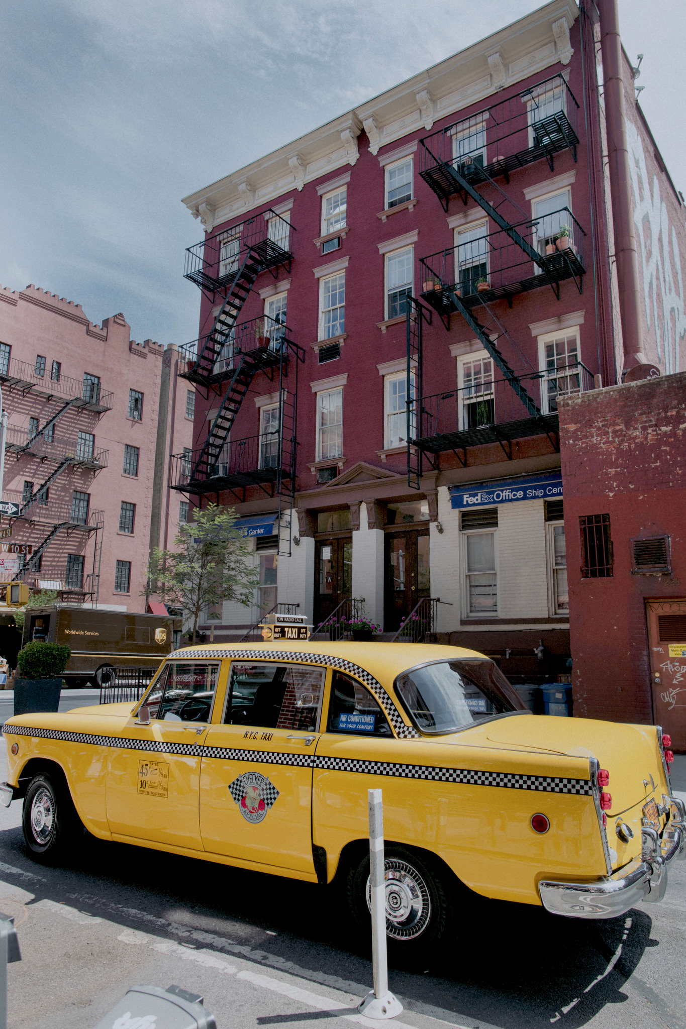 Old yellow taxi in streets of Manhattan used for wedding photos