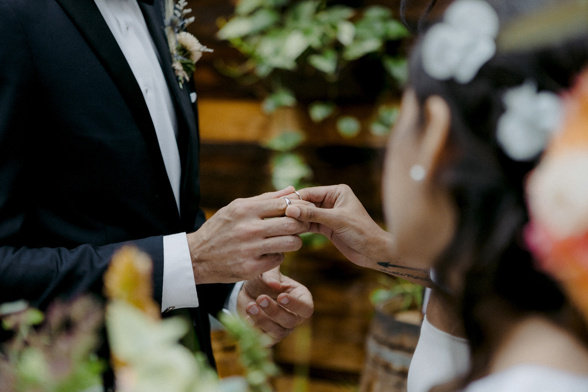 Bride and groom exchanging rings in Brooklyn