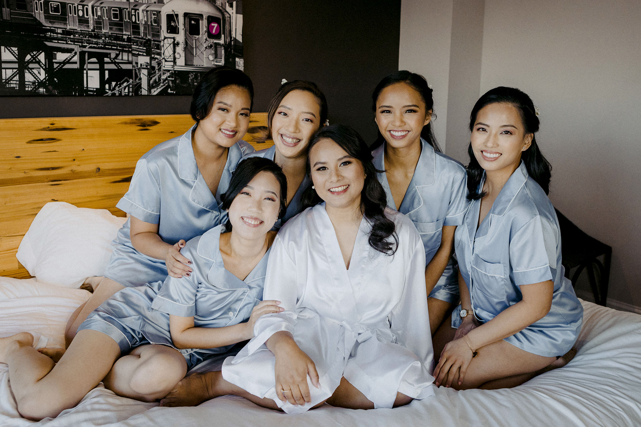 Bride and her bridesmaids in a hotel room at the Ravel Hotel