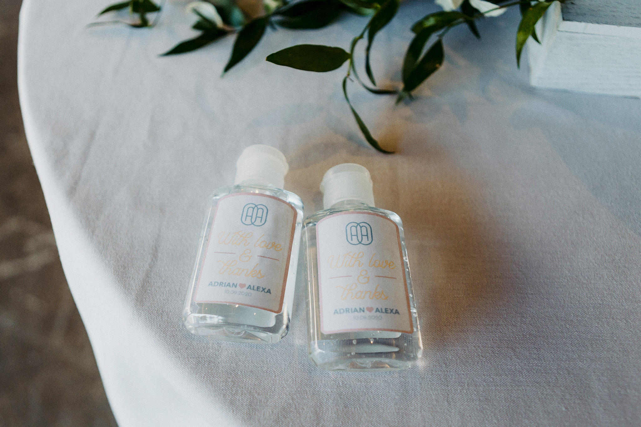 Custom hand sanitizer as favors at a wedding