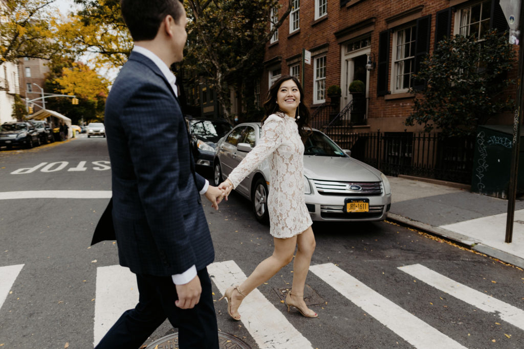 Man and woman crossing the street in New York City