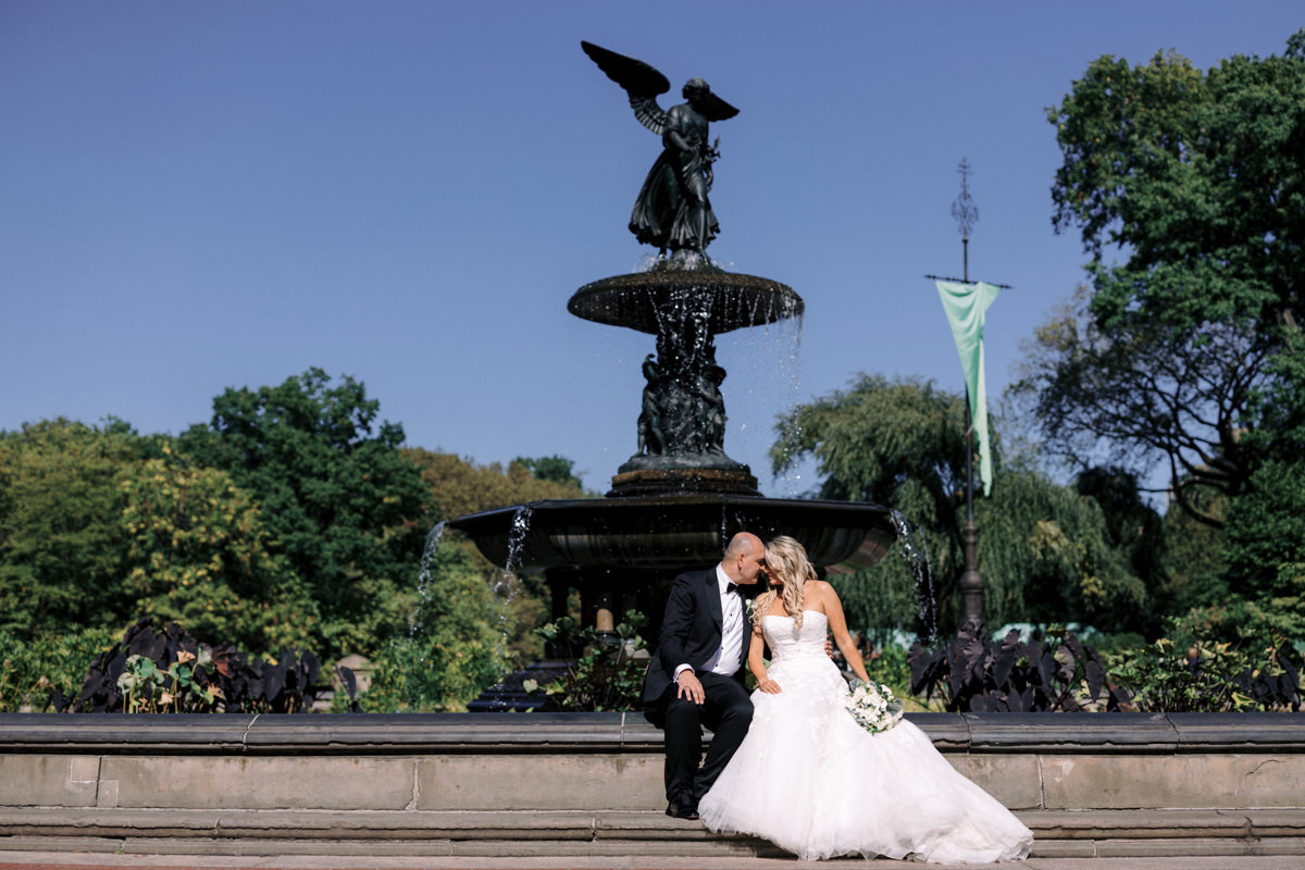 A couple taking their NYC wedding photos in Central Park