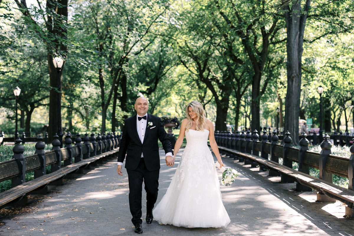 Bride and groom taking their wedding photos in New York's Central Park