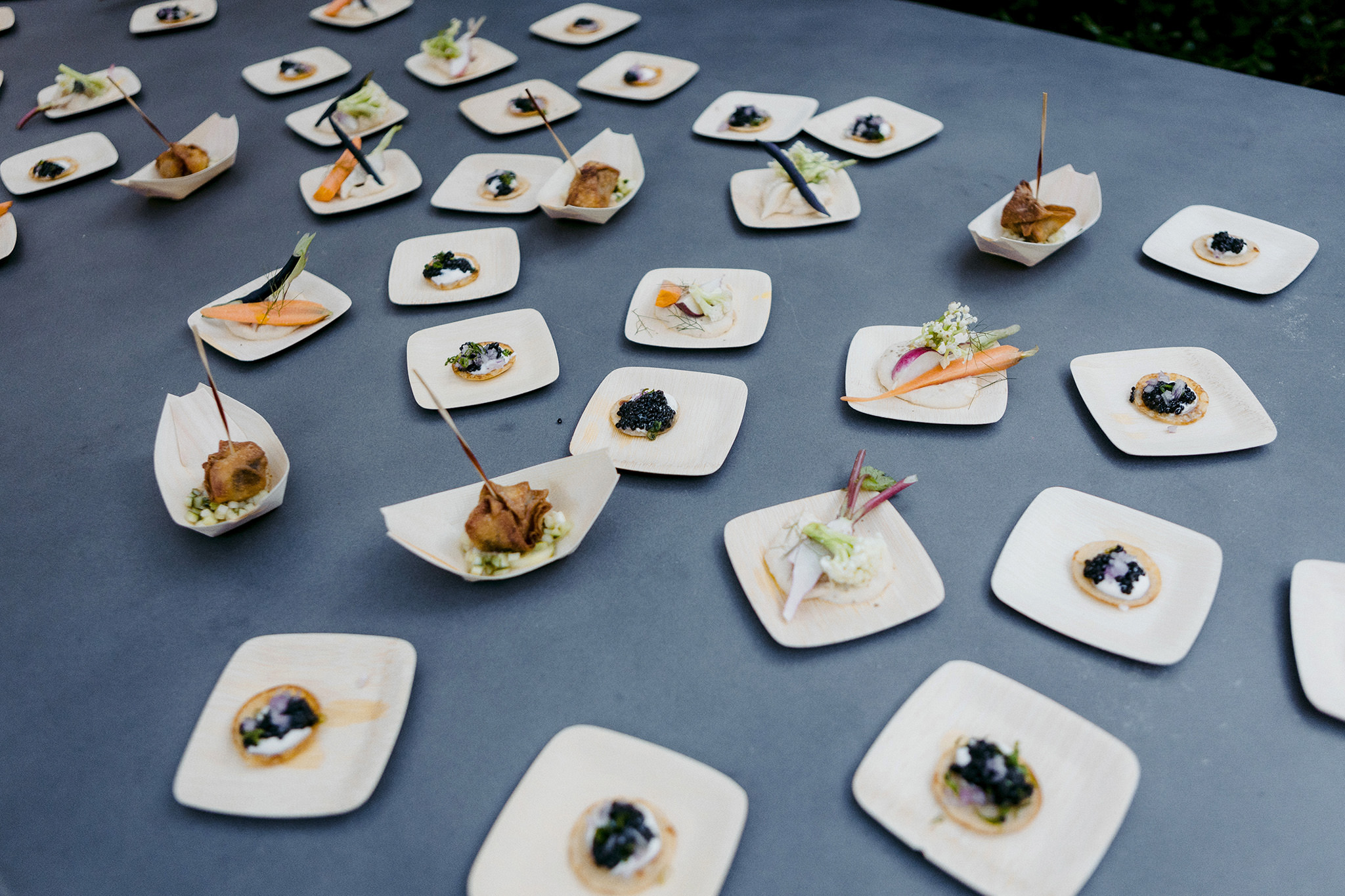 Eco-friendly bamboo plates at a rooftop wedding