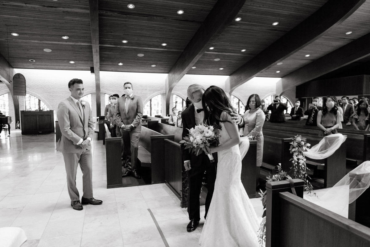 An NYC wedding photographer takes photos at a ceremony in Dallas, Texas