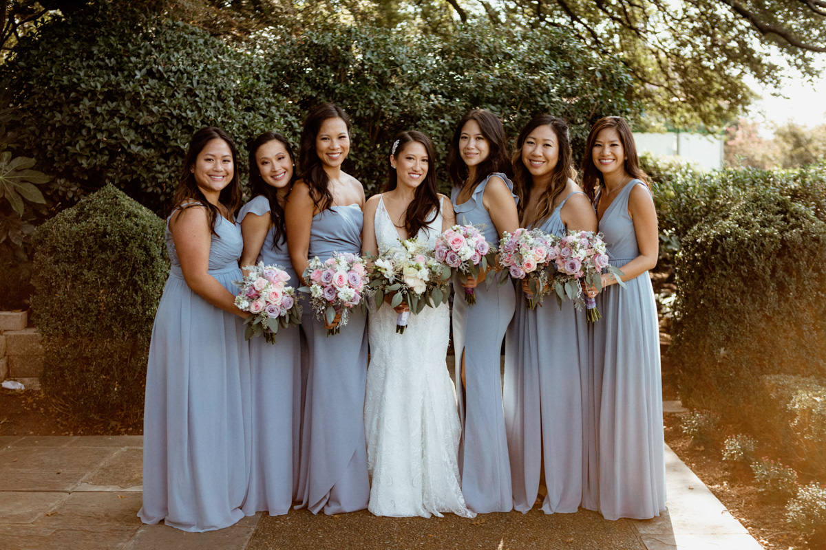 A bride and her bridesmaids at the Dallas Arboretum and Botanical Gardens