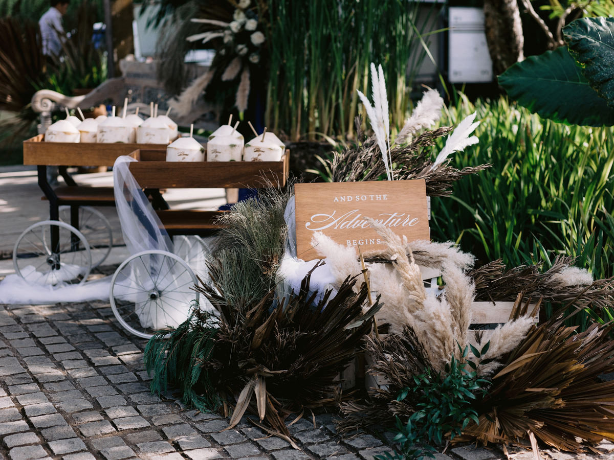 Coconuts sit on a table in Bali during a wedding