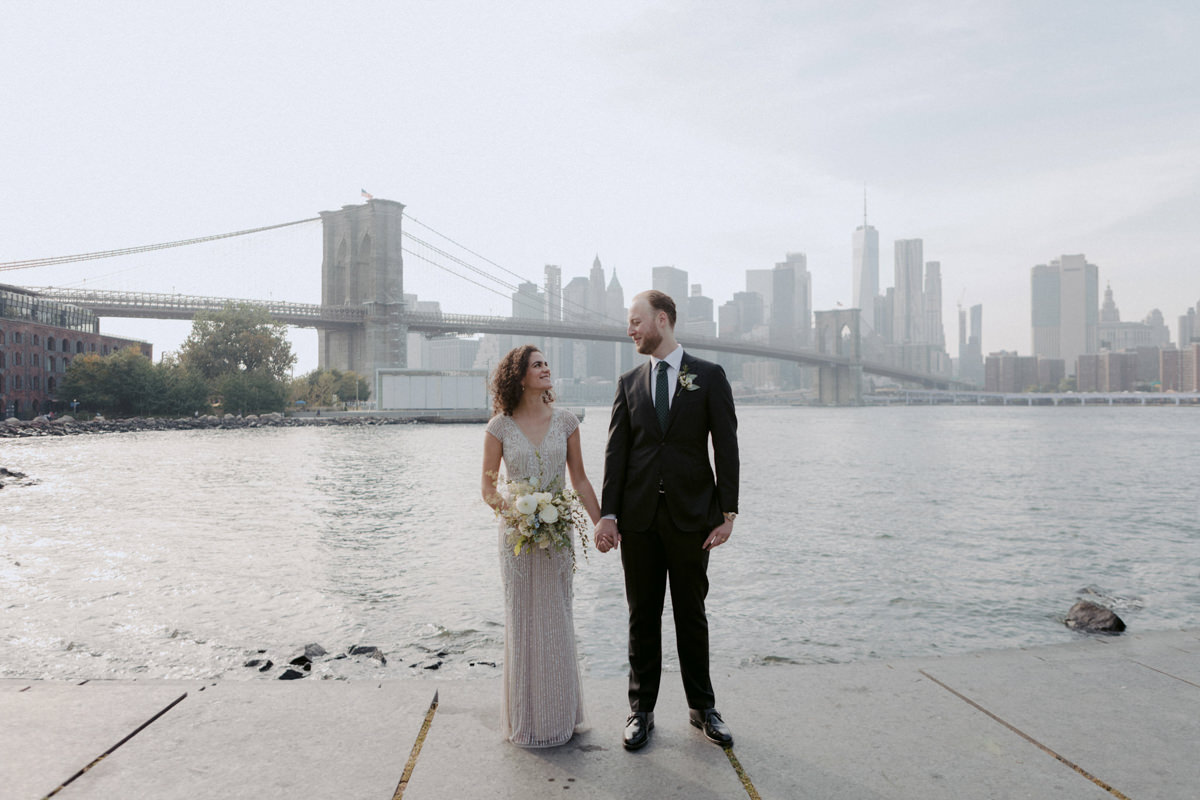 New York wedding photographer Jenny Fu captures couple with Brooklyn Bridge in the background