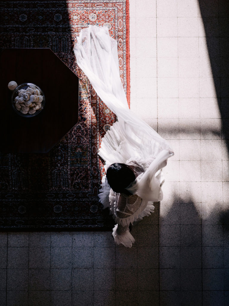A bride captured by her wedding photographer on her wedding day in Lake Como