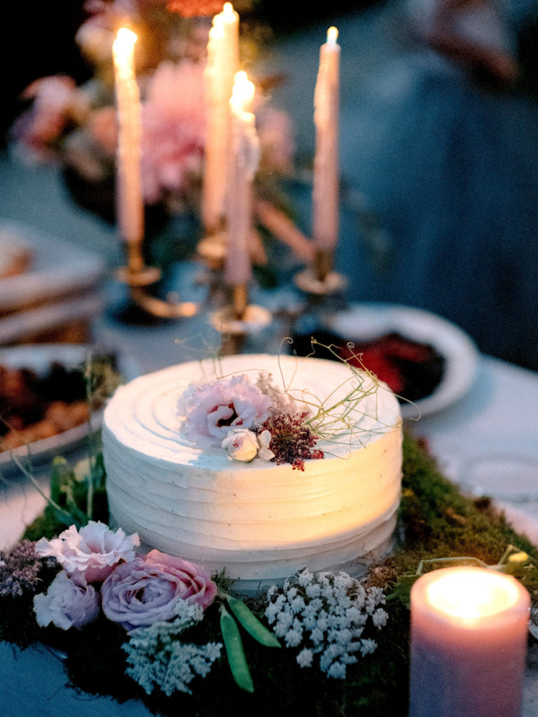 A wedding cake with foliage