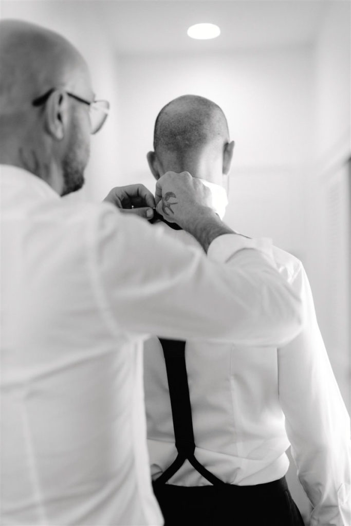 Groom gets ready at-home for his wedding