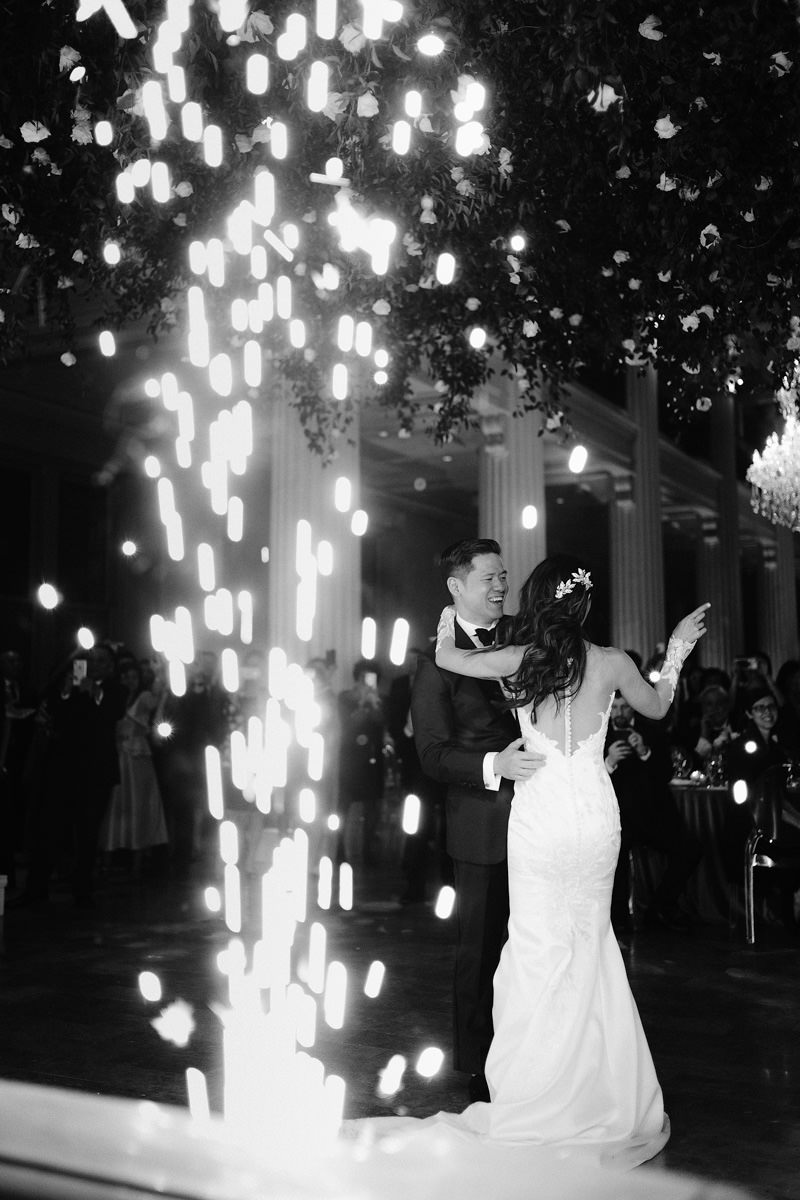 Sparks flying as a bride and groom share their first dance as husband and wife
