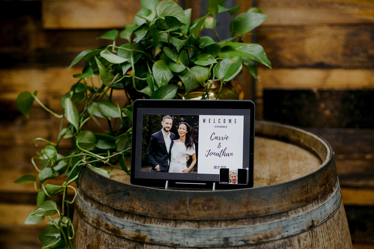 An iPad displaying a wedding virtually for guests all over the world