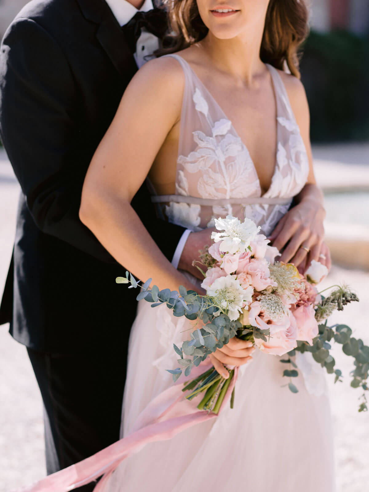 Half-body shot of the bride and the groom. Outdoor wedding destination image by Jenny Fu Studio