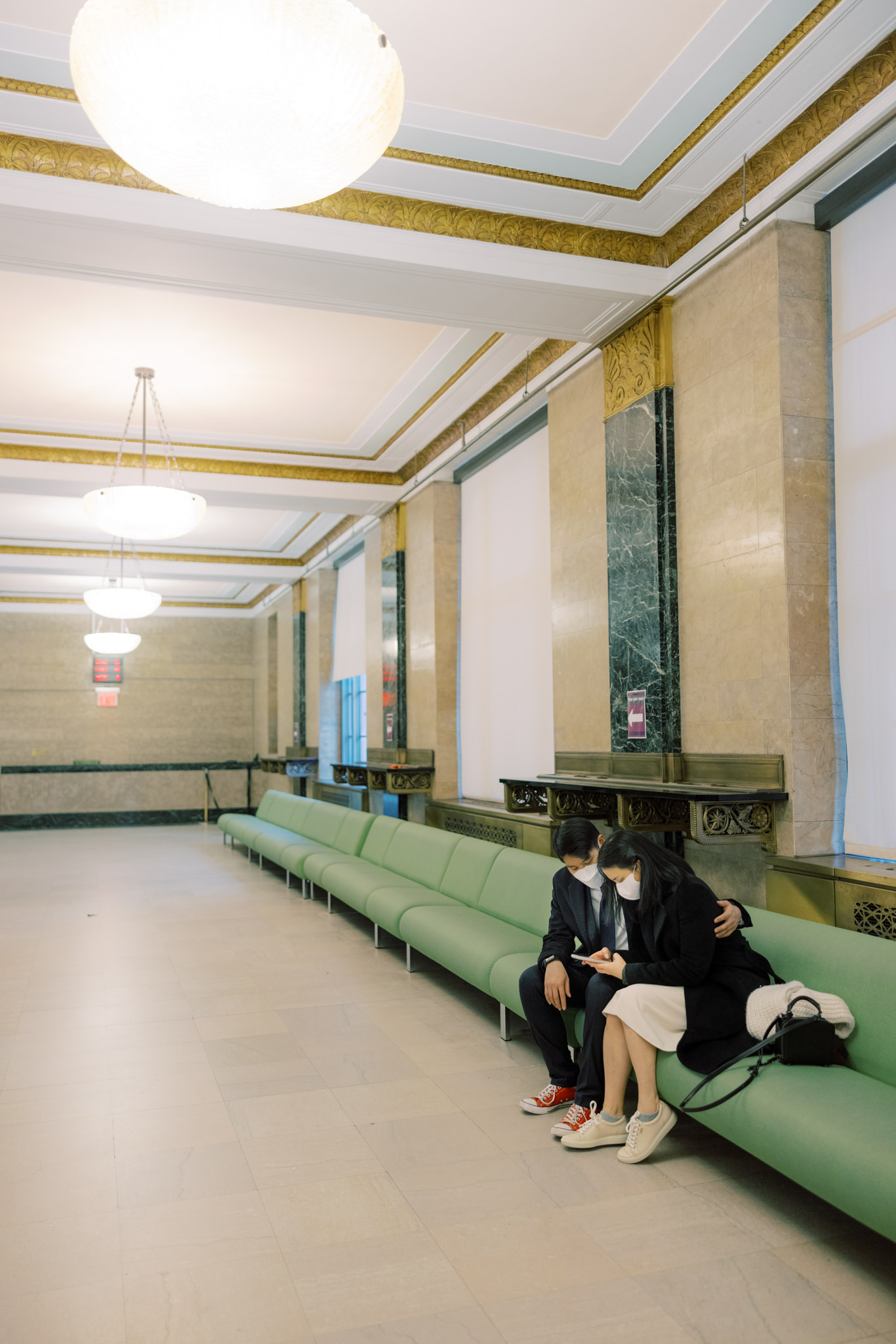 The bride and groom are waiting for the ceremony to start. 2022 city hall wedding in NYC photo by Jenny Fu Studio