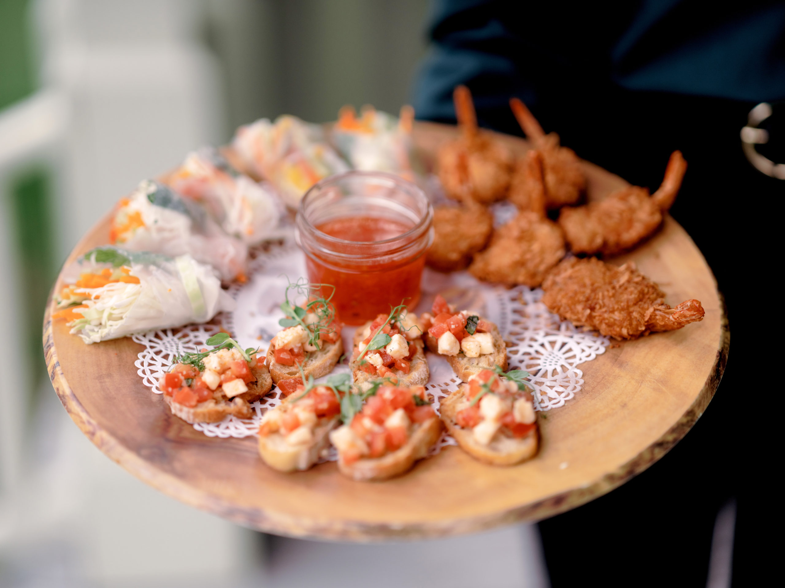 A tray of appetizers at the wedding reception in The Ausable Club, New York. Image by Jenny Fu Studio