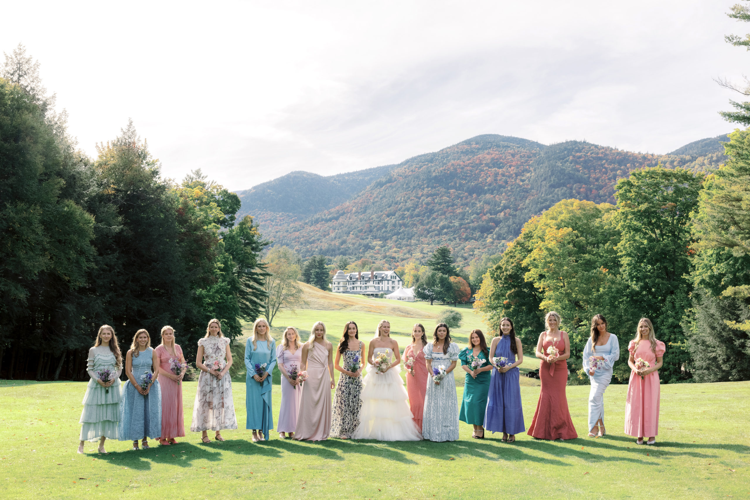 The bride and her bridesmaids in the middle of The Ausable Club golf course. Image by Jenny Fu Studio