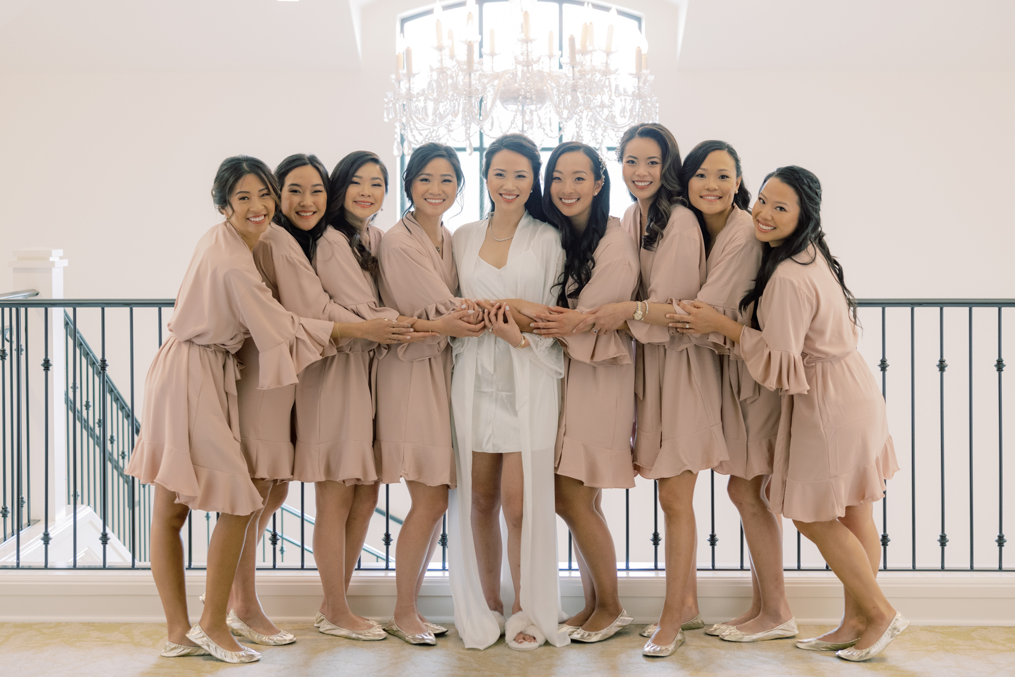 The bride and bridesmaids are preparing for the wedding. Image by Jenny Fu Studio
