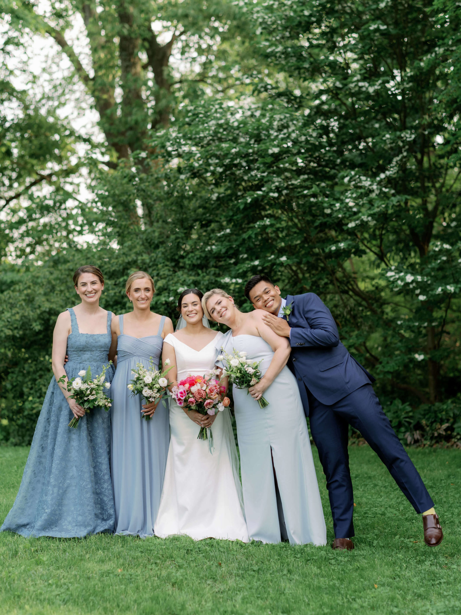 The bride and her bridesmaids wearing their 2022 bridesmaid dress. Image by Jenny Fu Studio