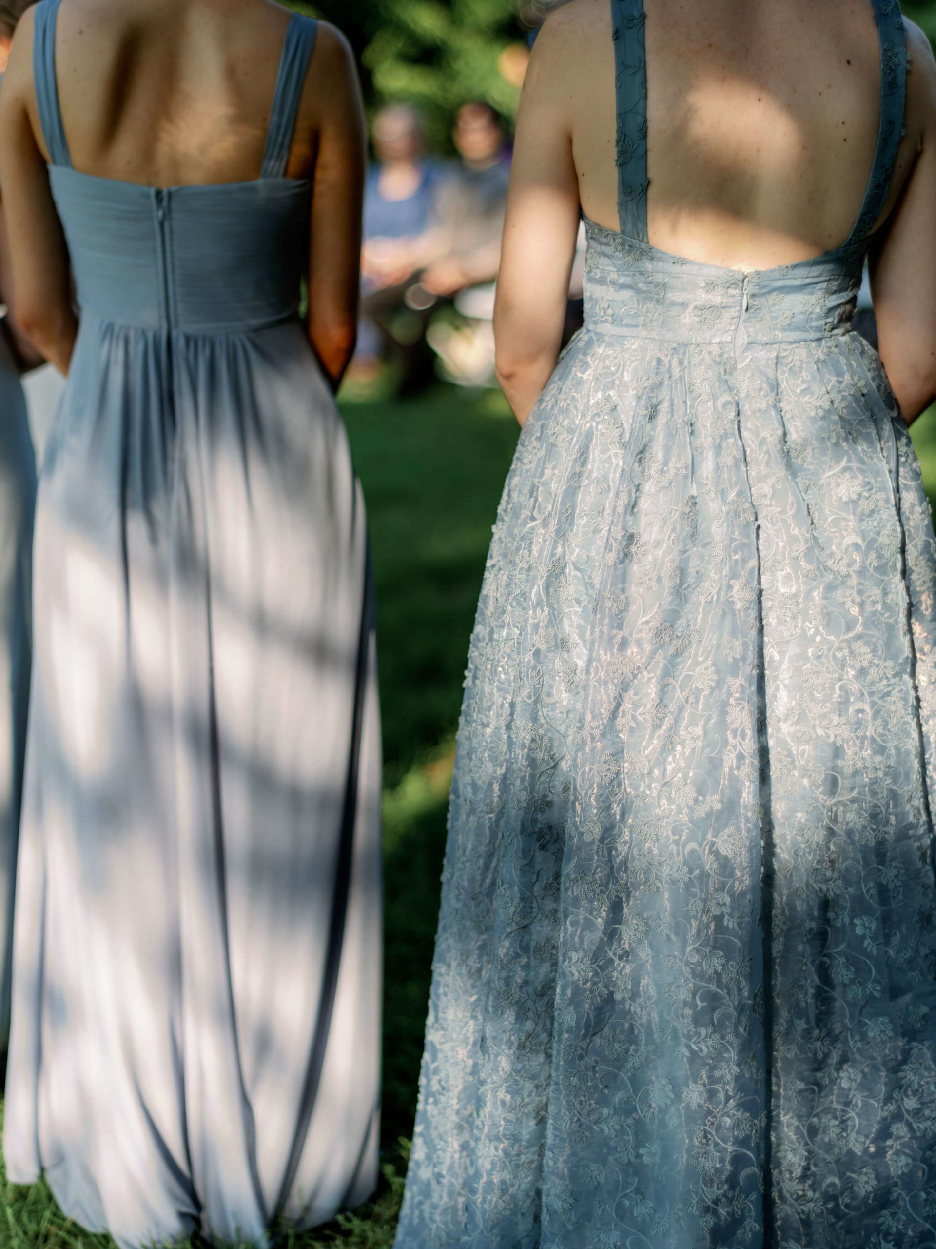 The bridesmaids on their backs wearing 2022 bridesmaid dress. Editorial wedding image by Jenny Fu Studio.