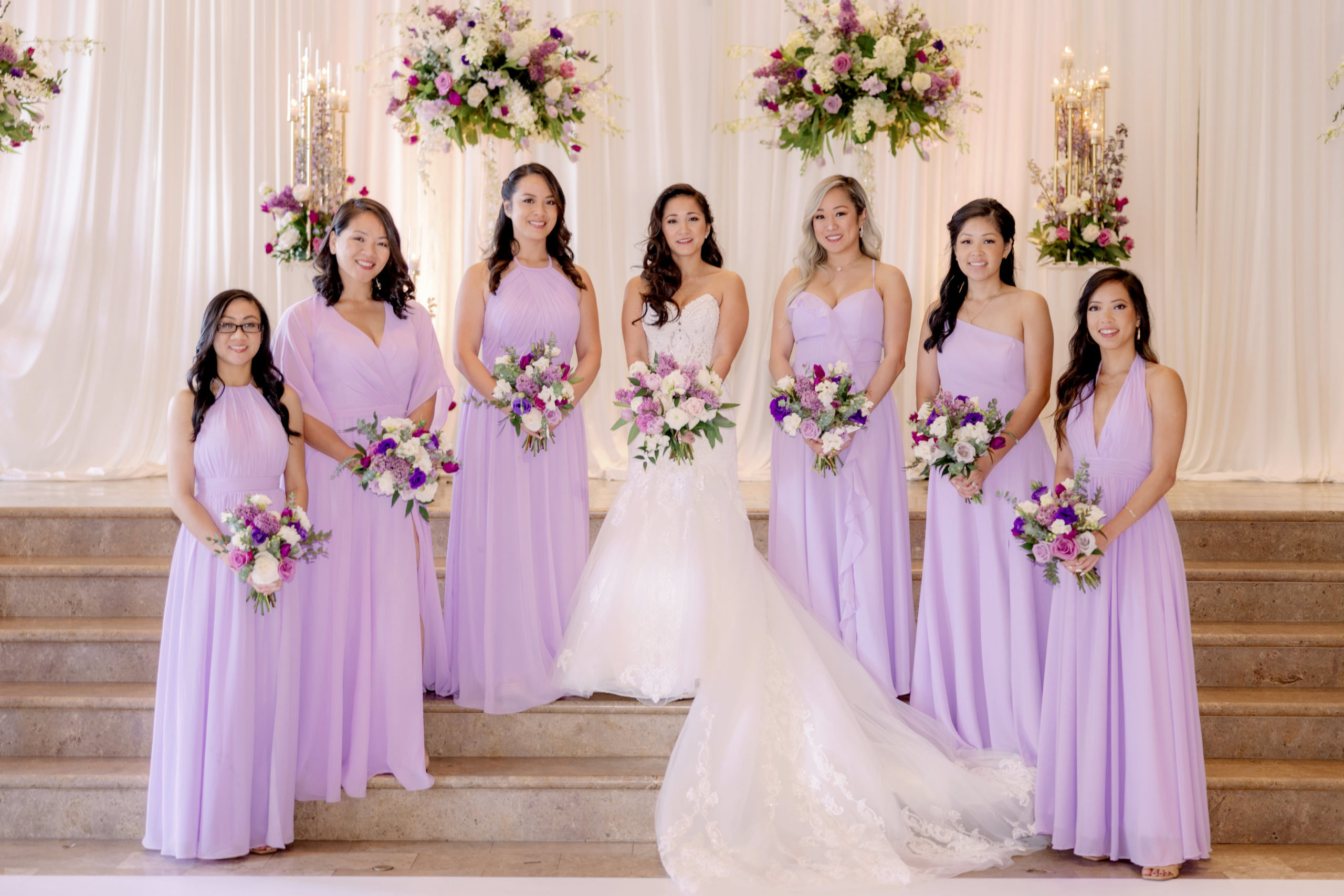 The bride and her bridesmaids wearing 2022 bridesmaid dresses. Editorial wedding image by Jenny Fu Studio.