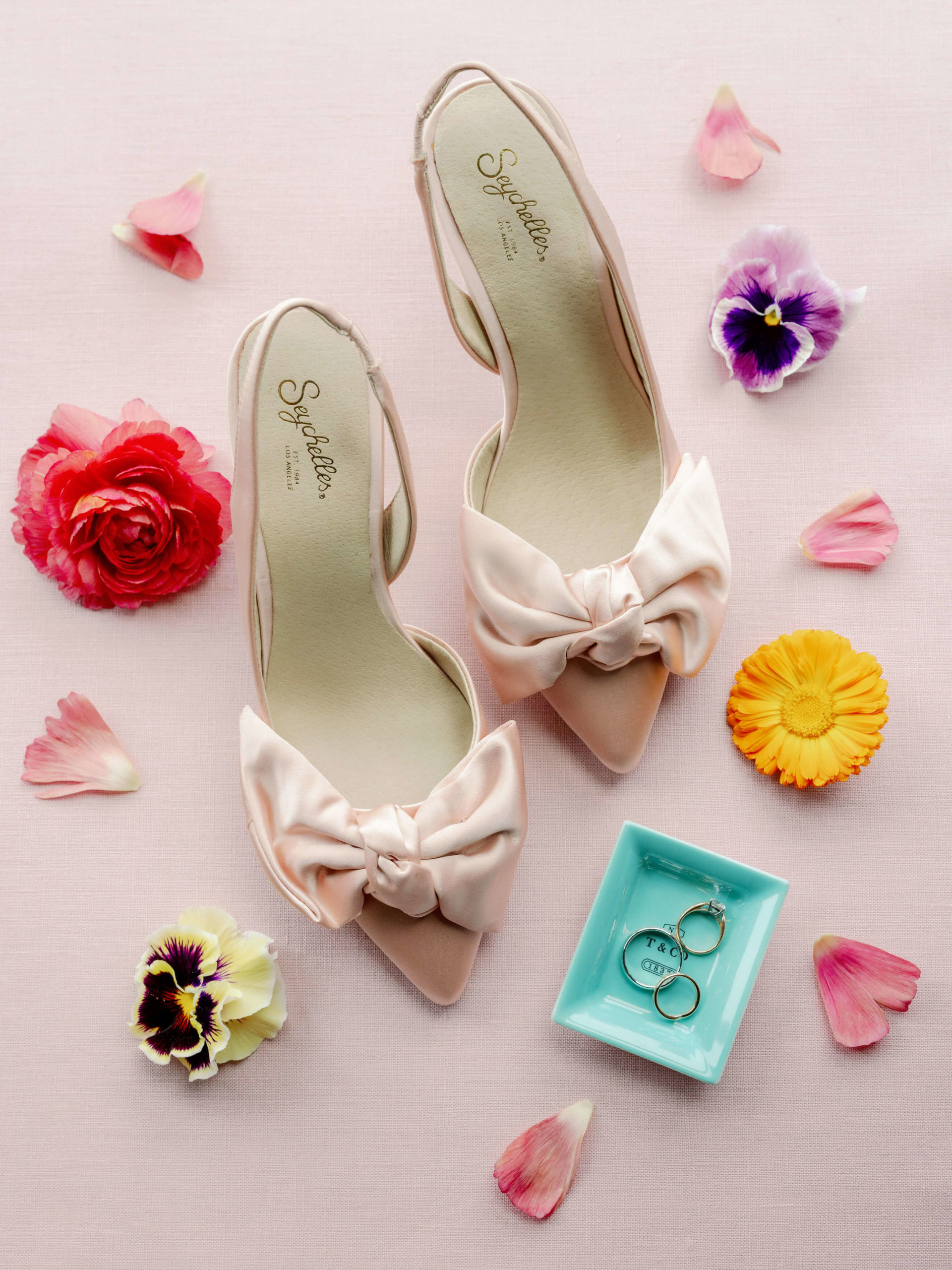 Wedding shoes, engagement ring and wedding bands for a wedding in NYC. Editorial wedding image by Jenny Fu Studio.