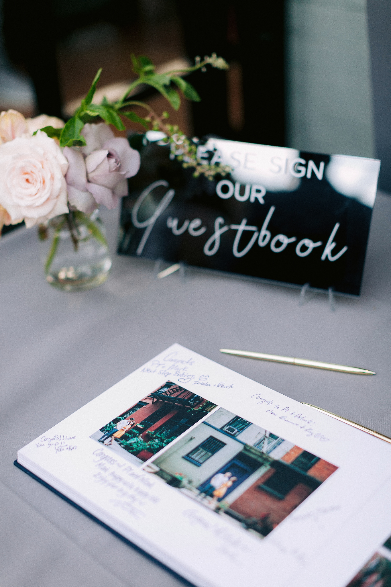 A wedding guestbook with engagement images printed on it. Editorial engagement photo by Jenny Fu Studio