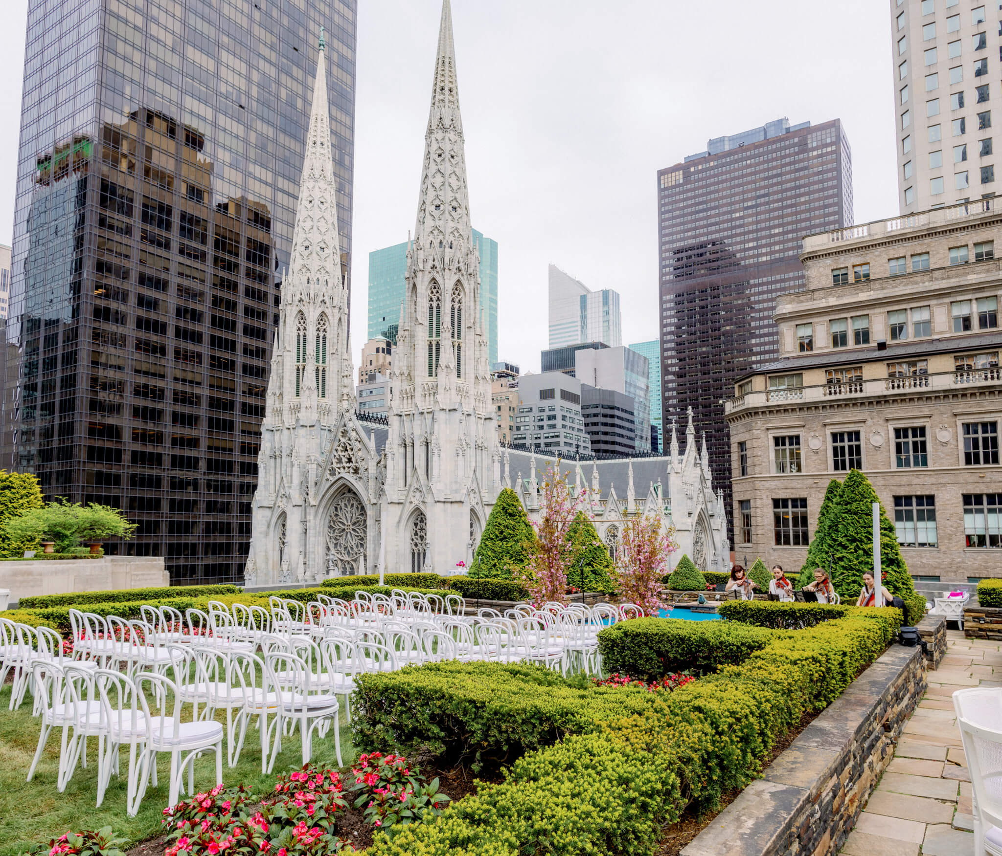 A luxury wedding venue at 620 Loft and Garden with St. Patrick's Cathedral in the background. Image by Jenny Fu Studio