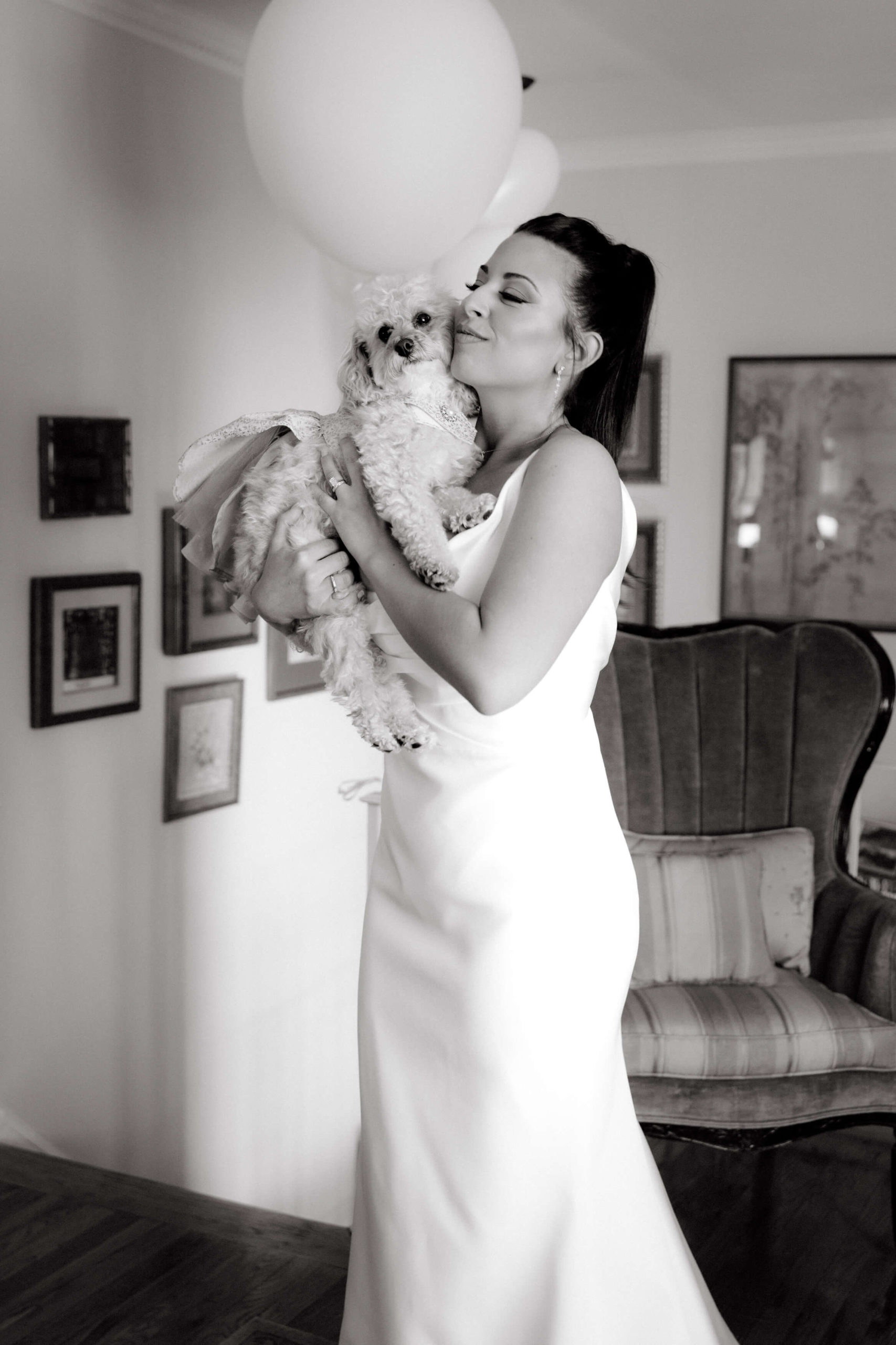 Editorial photo of the bride cuddling her dog. NYC wedding with your pet image by Jenny Fu Studio