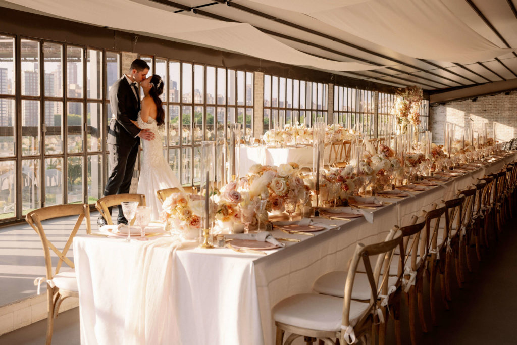 bride and groom enjoying their wedding space and kissing at the ravel hotel in Long Island city New York