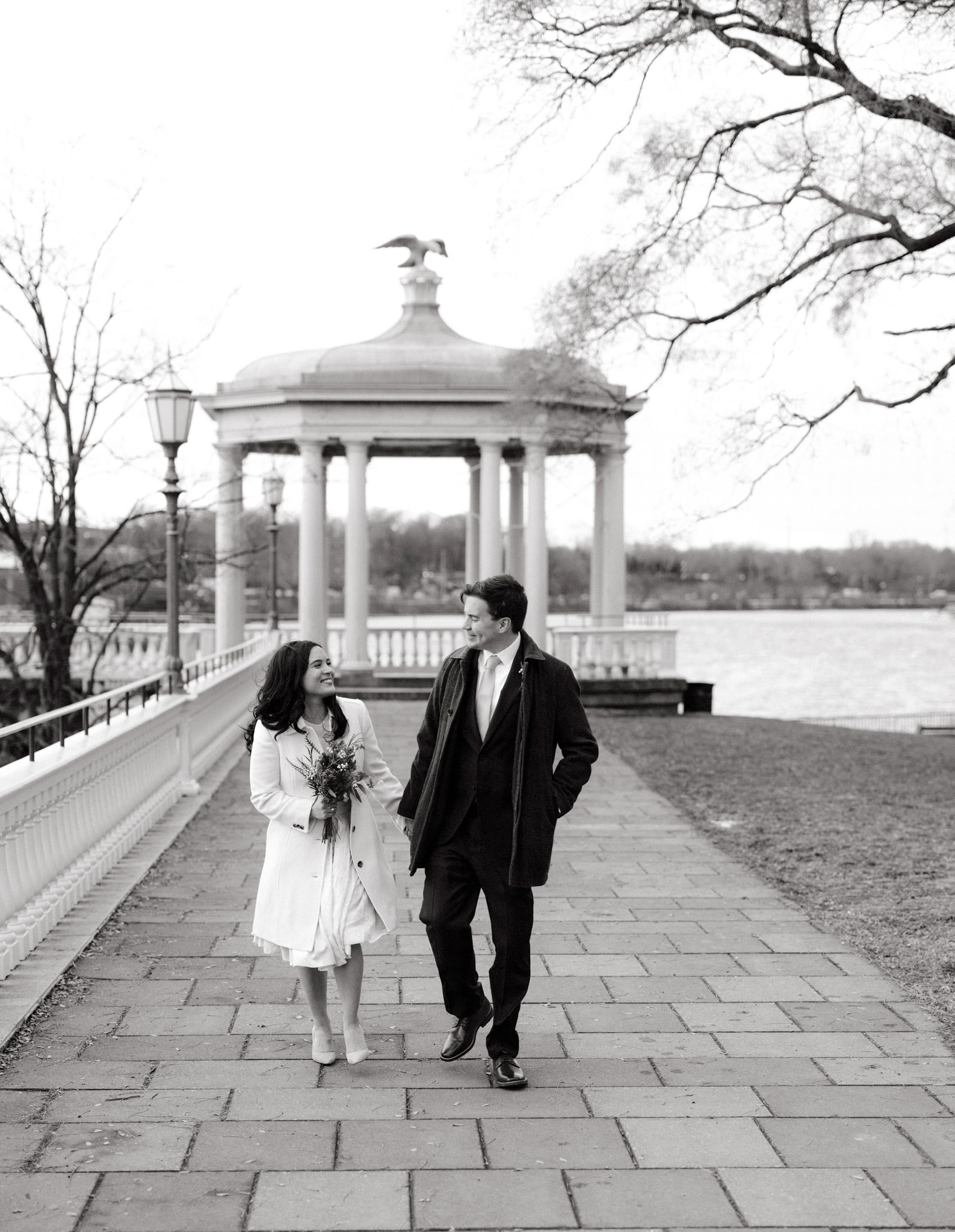 Editorial image of the newly-weds walking on the pathway after the wedding ceremony. Image by Jenny Fu Studio