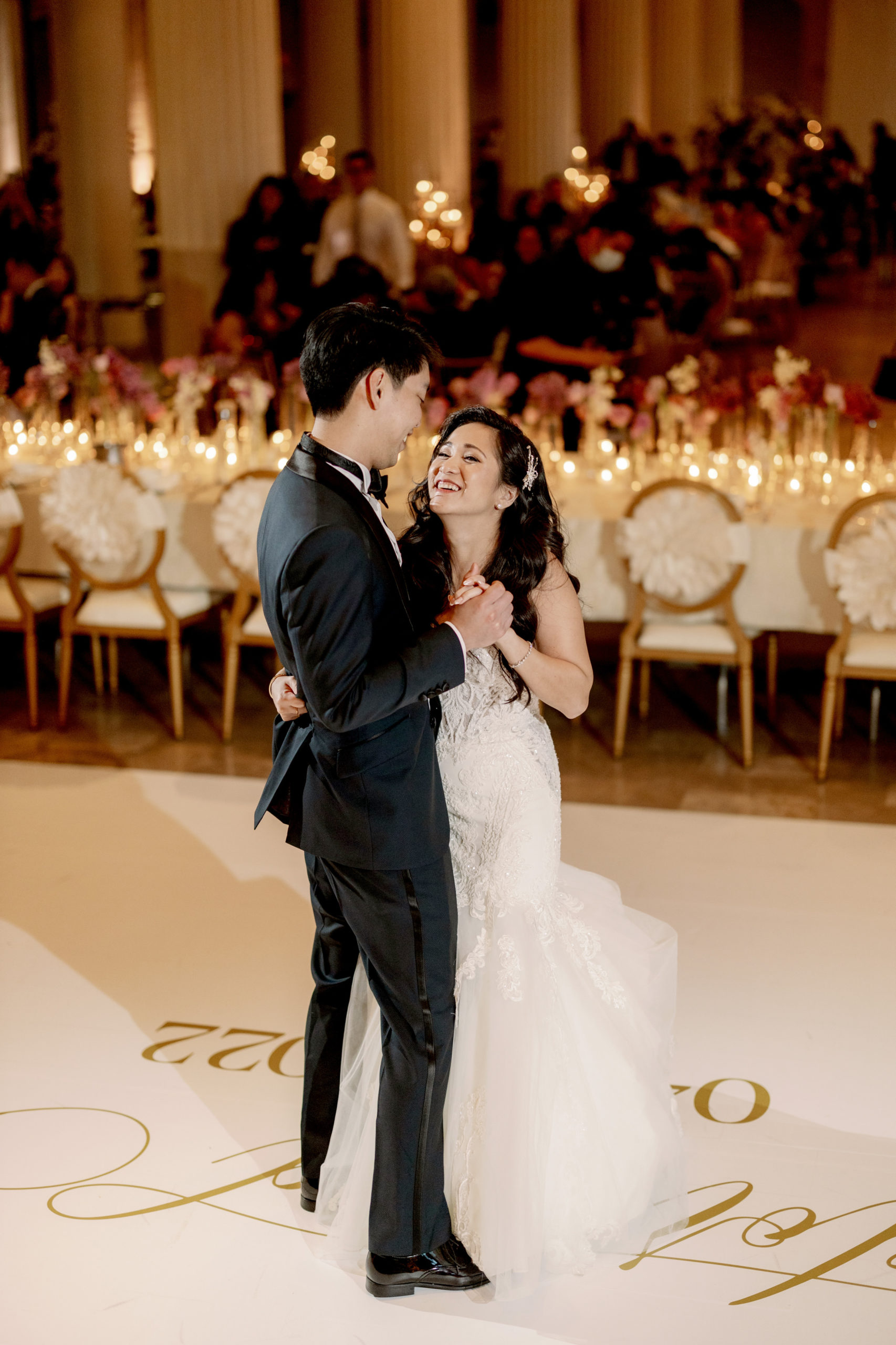 The newly-weds are dancing in the reception. Luxury wedding photography image by Jenny Fu Studio