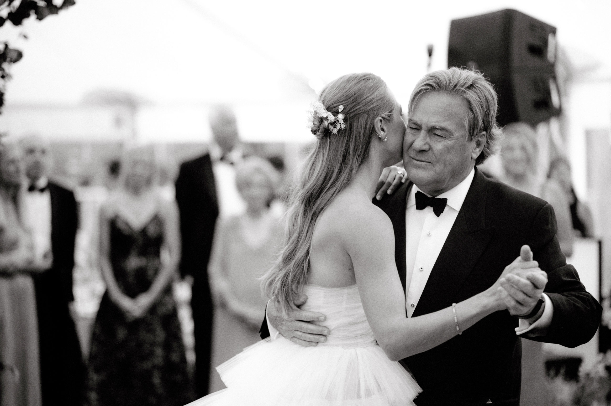 Black and white image of the father and daughter dance at The Ausable Club. Candid wedding photography image by Jenny Fu Studio