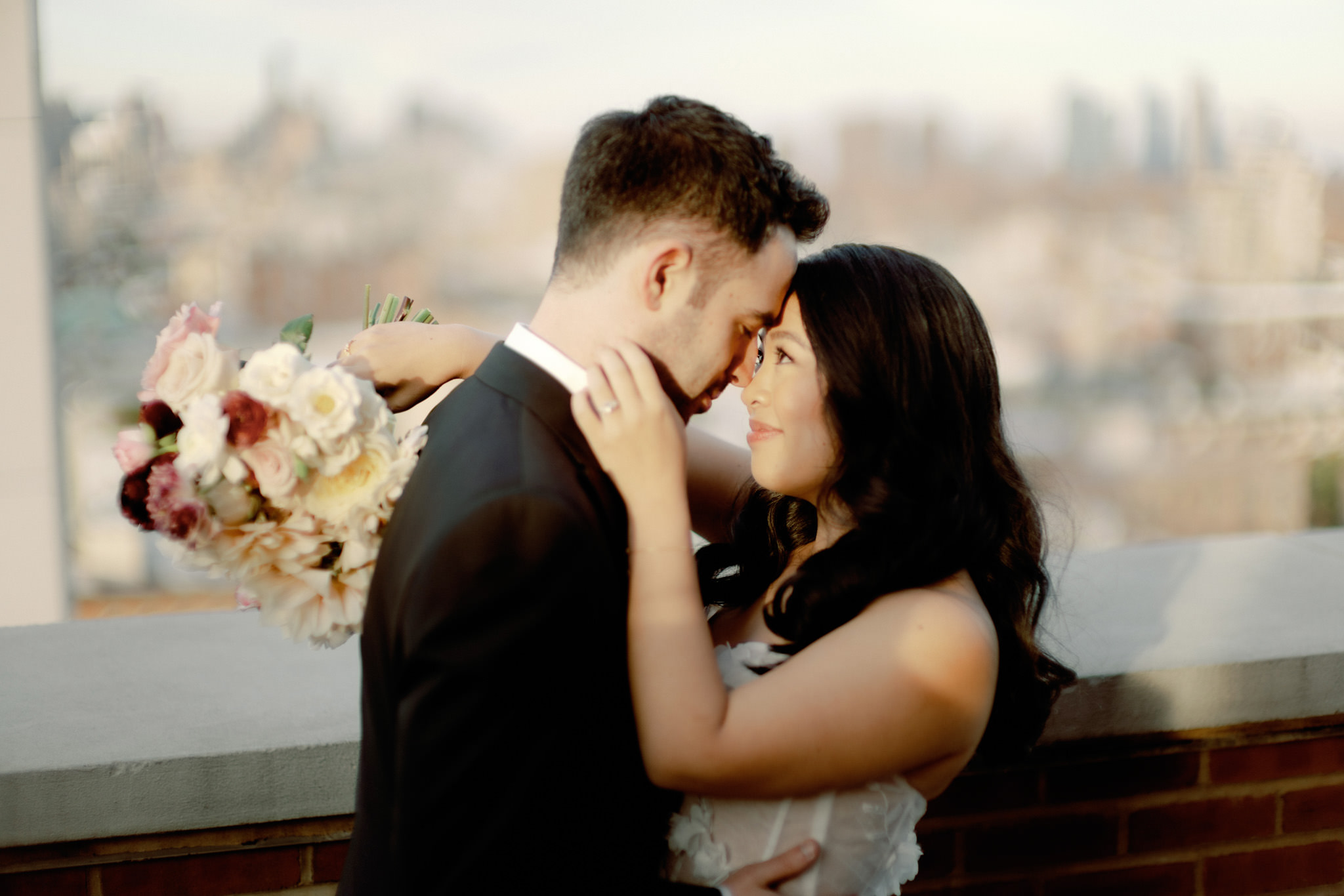 The bride and groom's romantic photo in NYC. Editorial image by Jenny Fu Studio.