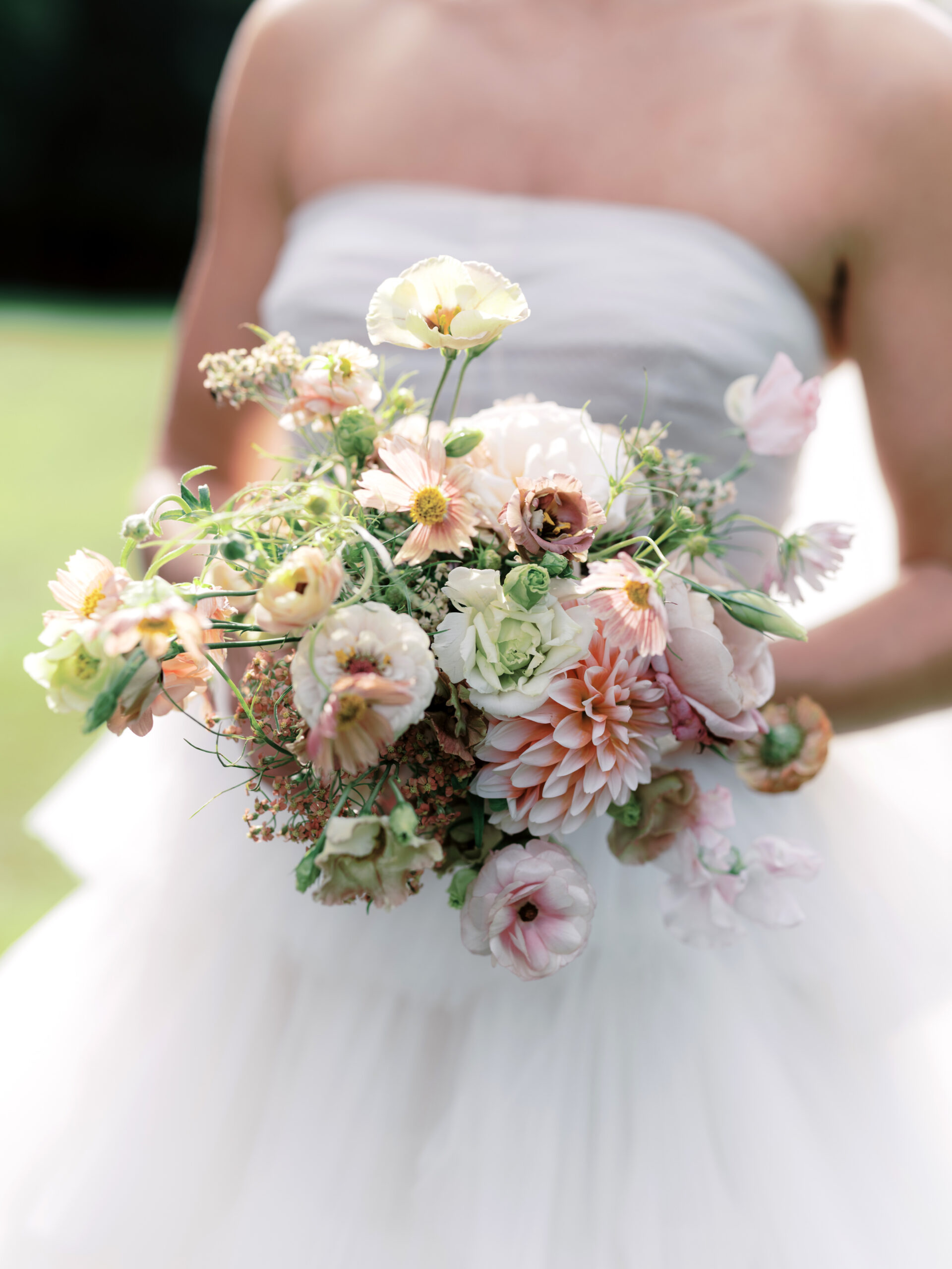 The bride's beautiful bouquet of flowers. Upstate New York luxury wedding image by Jenny Fu Studio.