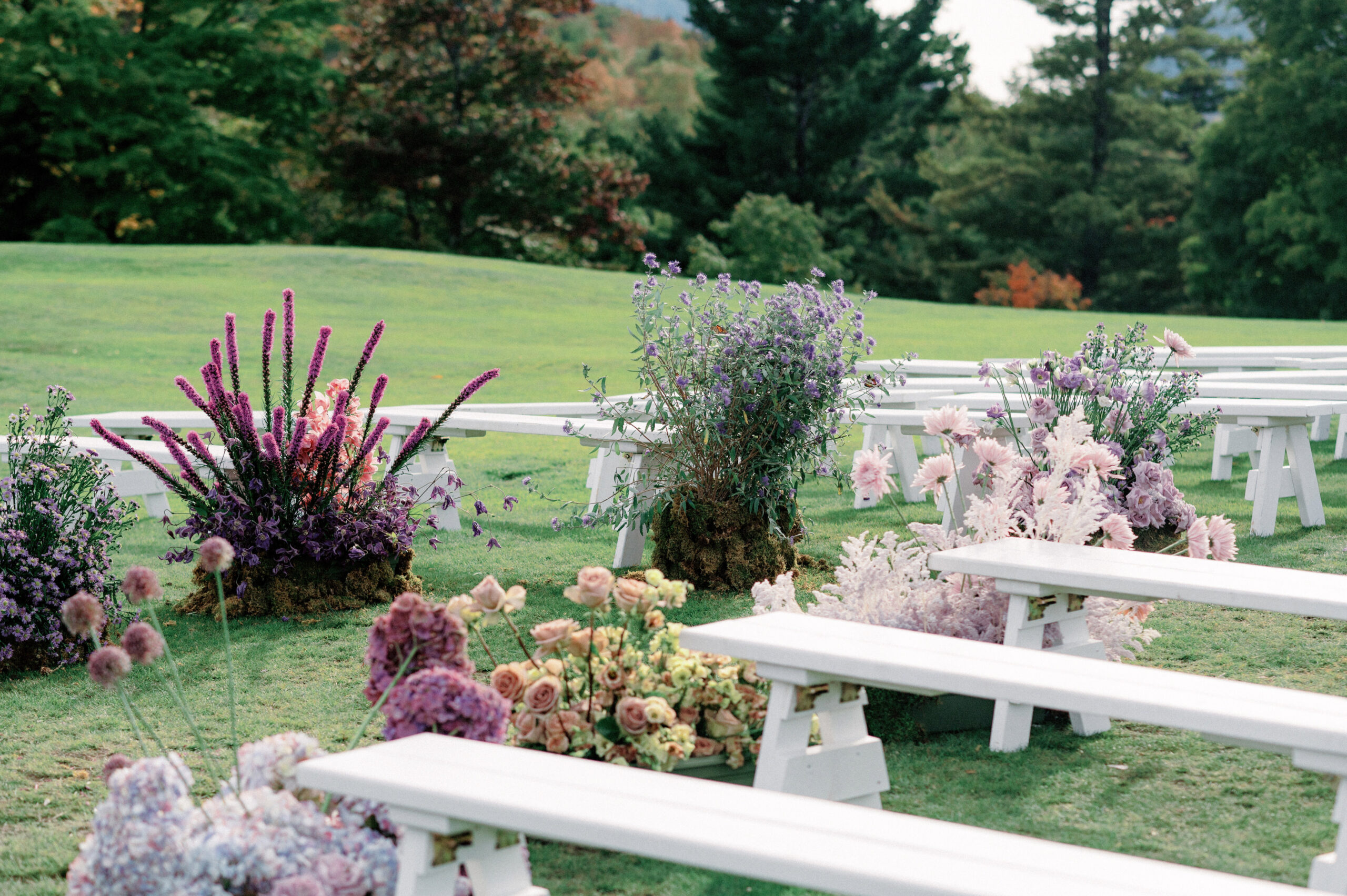 Wedding ceremony set-up with beautiful flowers. Upstate New York luxury wedding image by Jenny Fu Studio.