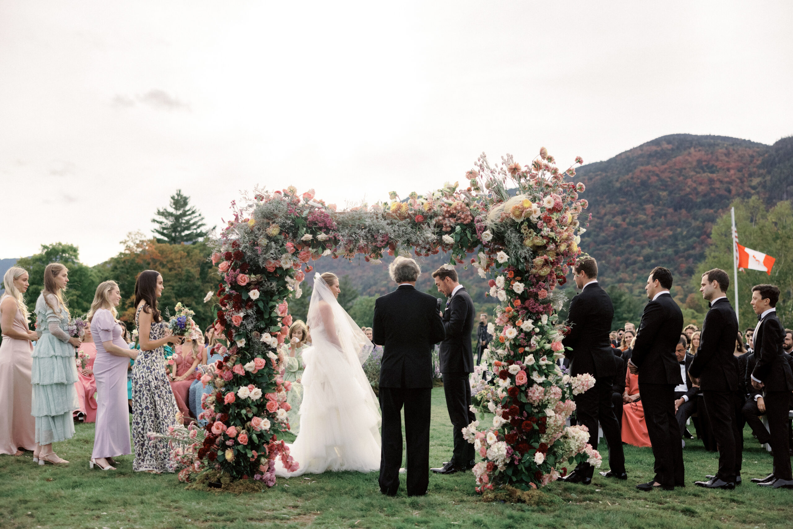 Editorial image of the wedding ceremony at The Ausable Club, NY. Upstate New York luxury wedding image by Jenny Fu Studio.