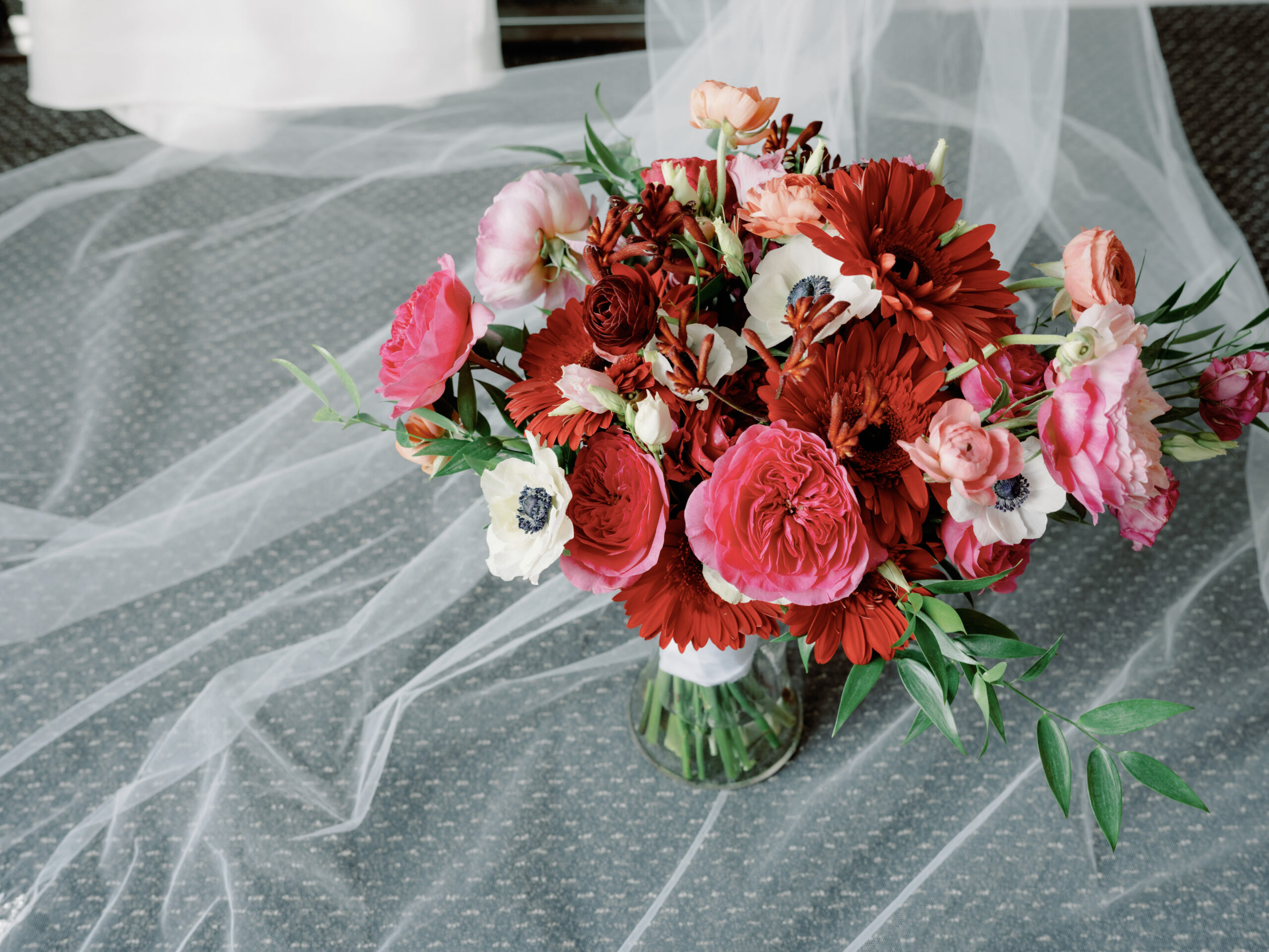 Beautiful Bridal Flower bouquet in red, pink and white shades. Image by Jenny Fu Studio