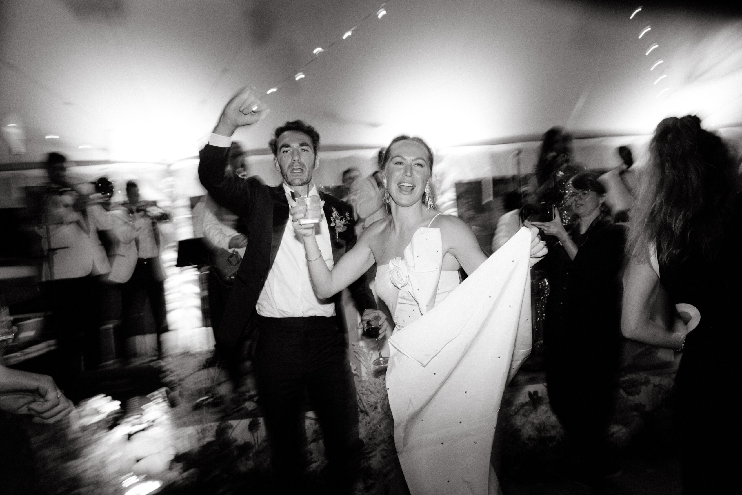 Candid photo of the bride and groom while in the dance froo
