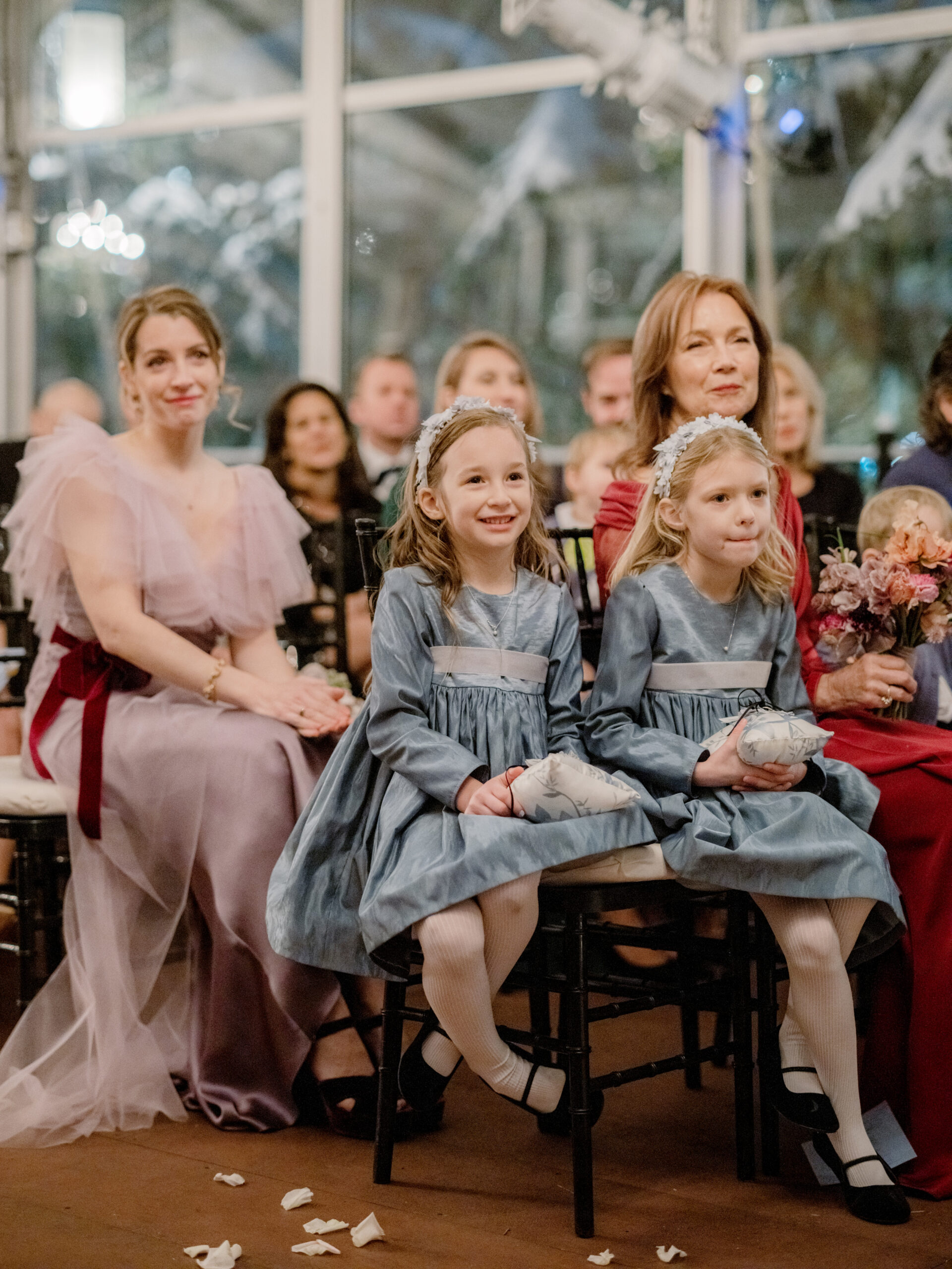 The bride's family are happily watching the wedding ceremony. Image by Jenny Fu Studio